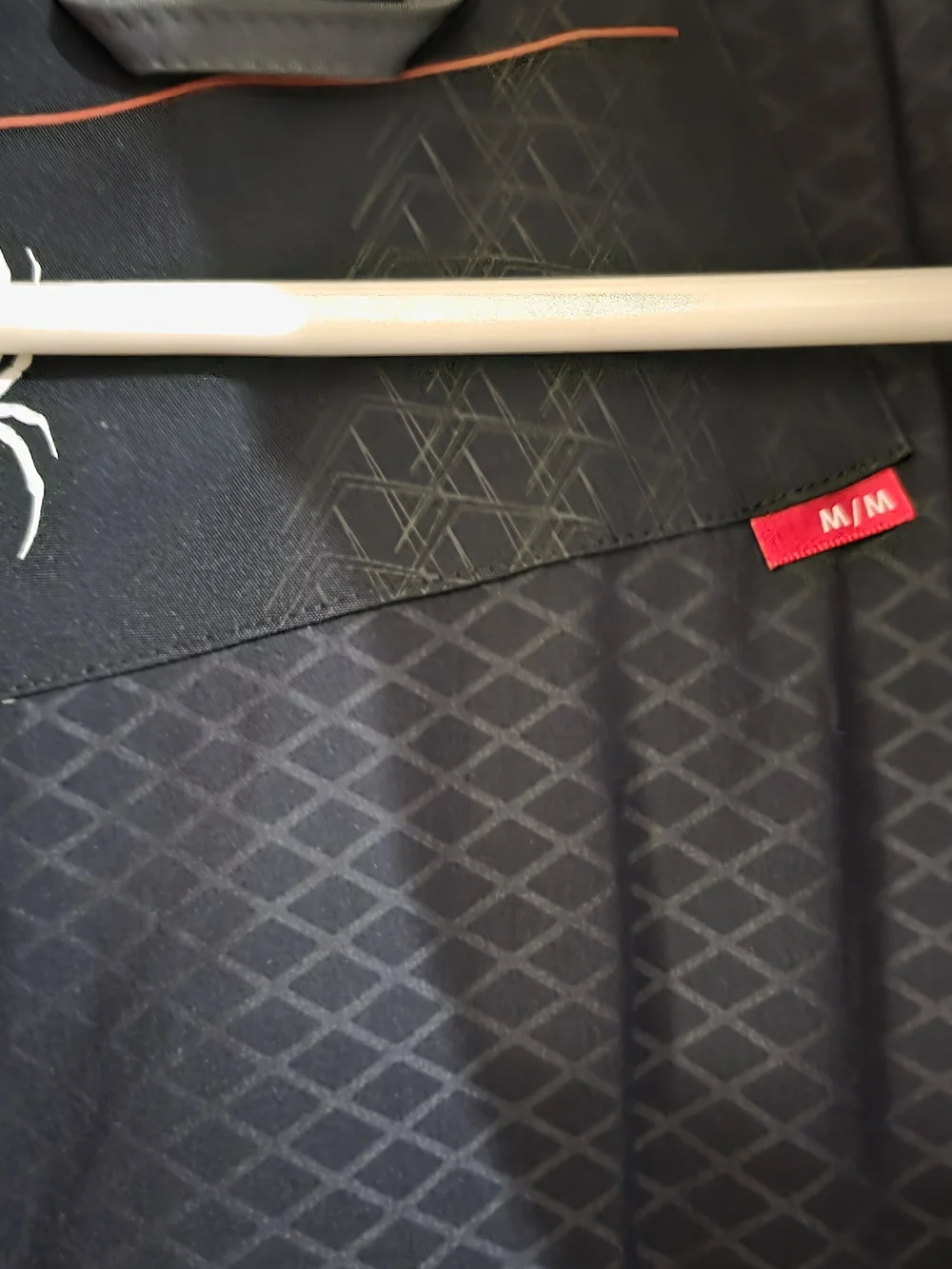 Spyder Men's Gray and Black Ski Jacket with Red Accents